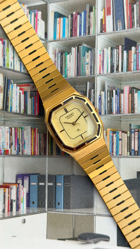 Orient Gold tank integrated bracelet